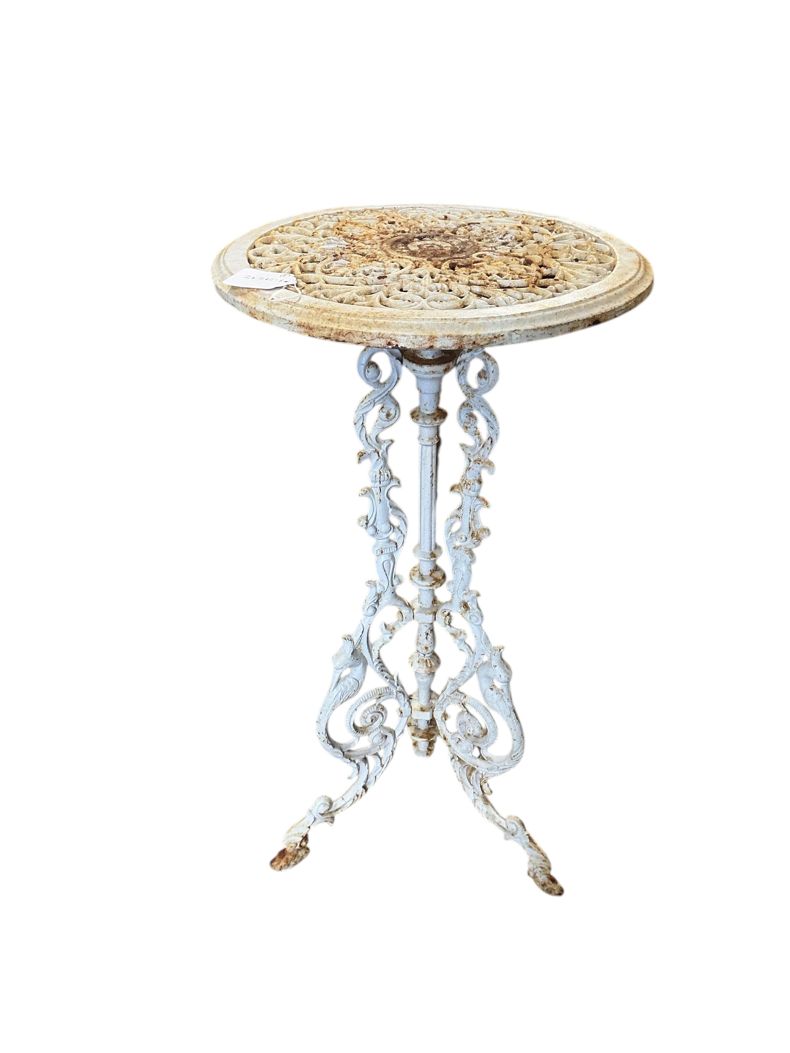 A pair of Victorian style circular painted cast iron stands, diameter 36cm, height 71cm
